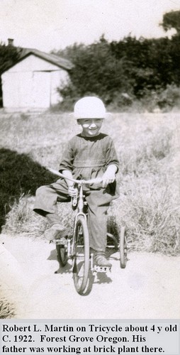 Robert L. Martin on Tricycle about 4 y old<br /> C. 1922.  Forest Grove Oregon. His<br /> father was working at brick plant there.