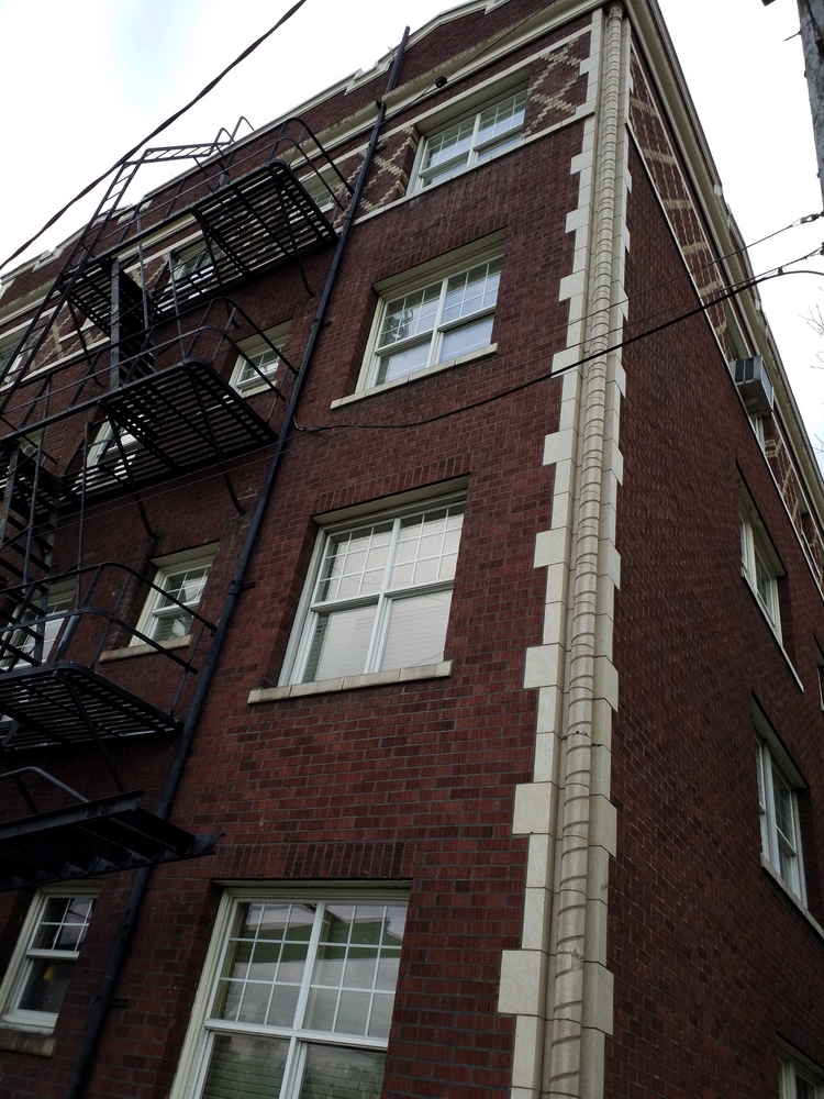 Photo taken Feb. 2018. Twisted column at the NW corner of the Empress Apartments Hotel.  Built in 1926 at 16th and Washington.  Current Address in 2017 is 1539-1541 W Burnside. Order #165 Glaze #22M in Leonard Martins order book for Columbia Terra Cotta Co.  The name of the hotel was for a period of time "Marquette Manor"