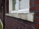 Photo taken Feb. 2018. Window sill on the west side of the Empress Apartments Hotel.  Built in 1926 at 16th and Washington.  Current Address in 2017 is 1539-1541 W Burnside. Order #165 Glaze #22M in Leonard Martins order book for Columbia Terra Cotta Co.  The name of the hotel was for a period of time "Marquette Manor"