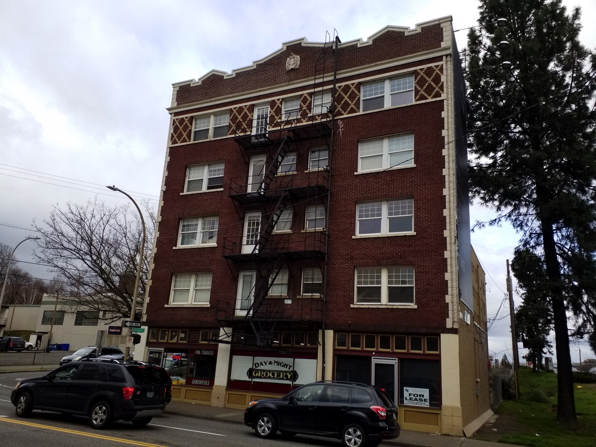 Photo taken Feb. 2018. South end of the Empress Apartments Hotel.  Built in 1926 at 16th and Washington.  Current Address in 2017 is 1539-1541 W Burnside. Order #165 Glaze #22M in Leonard Martins order book for Columbia Terra Cotta Co.  The name of the hotel was for a period of time "Marquette Manor"