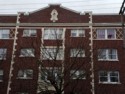 Photo taken Feb. 2018. West view upper detail of the Empress Apartments Hotel.  Built in 1926 at 16th and Washington.  Current Address in 2017 is 1539-1541 W Burnside. Order #165 Glaze #22M in Leonard Martins order book for Columbia Terra Cotta Co.  The name of the hotel was for a period of time "Marquette Manor"