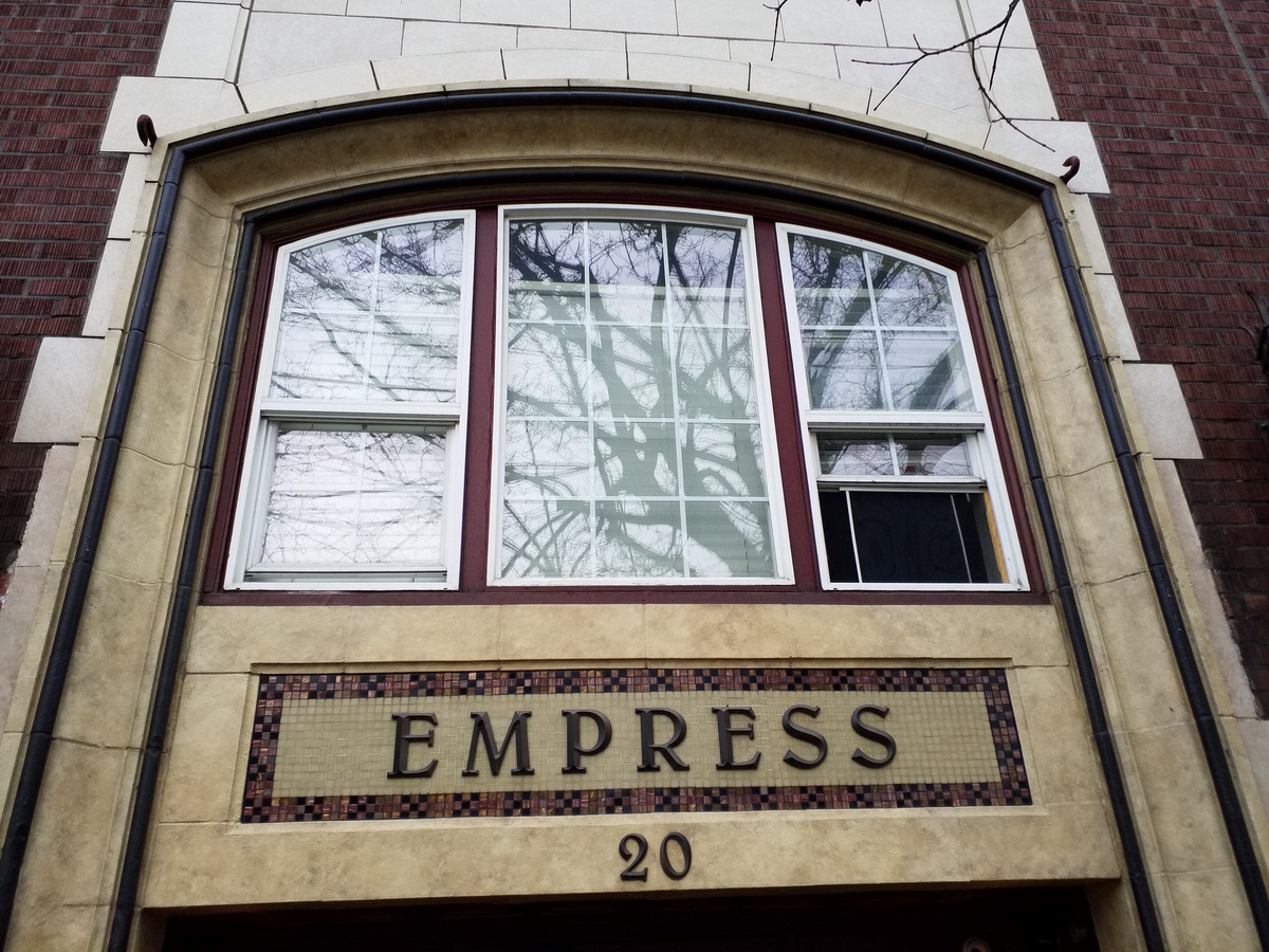 Photo taken Feb. 2018. The Empress Apartments Hotel. The name of the hotel was for a period of time "Marquette Manor". Built in 1926 at 16th and Washington.  Current Address in 2017 is 1539-1541 W Burnside. Order #165 Glaze #22M in Leonard Martins order book for Columbia Terra Cotta Co.  The yelloish terra cotta and the tile work appear to be painted and I suspect added after the 1950's.