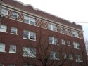 Photo taken Feb. 2018. View of the upper three floors at the south side of the west end of the Empress Apartments Hotel.  Built in 1926 at 16th and Washington.  Current Address in 2017 is 1539-1541 W Burnside. Order #165 Glaze #22M in Leonard Martins order book for Columbia Terra Cotta Co.  The name of the hotel was for a period of time "Marquette Manor"