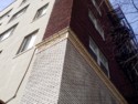 Photo taken Feb. 2018, NE coner detail. The Regency Hotel, at Broadway and Columbia, (1410 S.W. Broadway),  built in 1927.  Architecht: E. J. Pape.  Order #178 Glaze #223 and #402 in Leonard Martins order book for Columbia Terra Cotta Co.  The name of the hotel was for a period of time "St. Andrews Hotel"