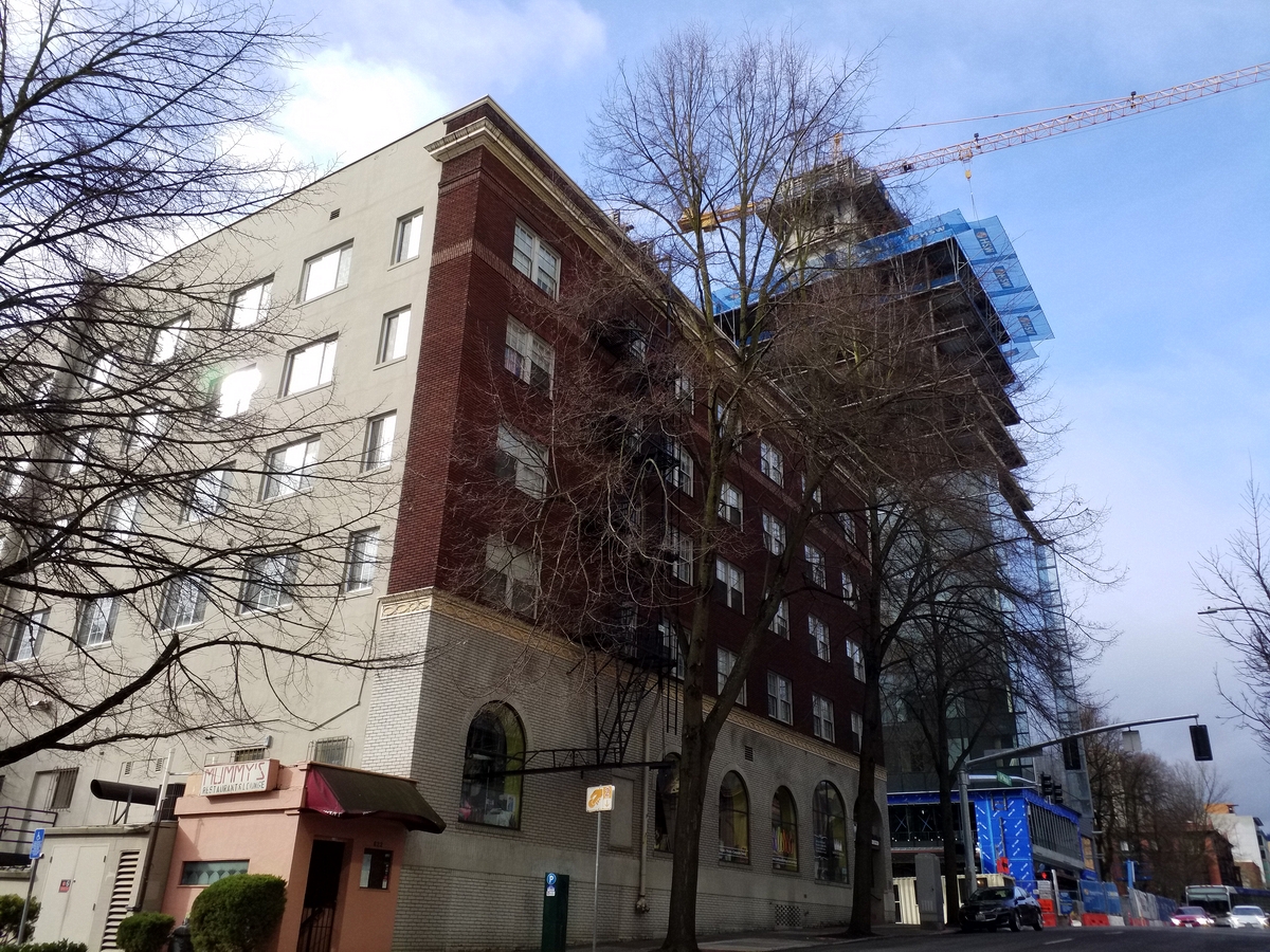 Photo taken Feb. 2018, from the North East. The Regency Hotel, at Broadway and Columbia, (1410 S.W. Broadway),  built in 1927.  Architecht: E. J. Pape.  Order #178 Glaze #223 and #402 in Leonard Martins order book for Columbia Terra Cotta Co.  The name of the hotel was for a period of time "St. Andrews Hotel"